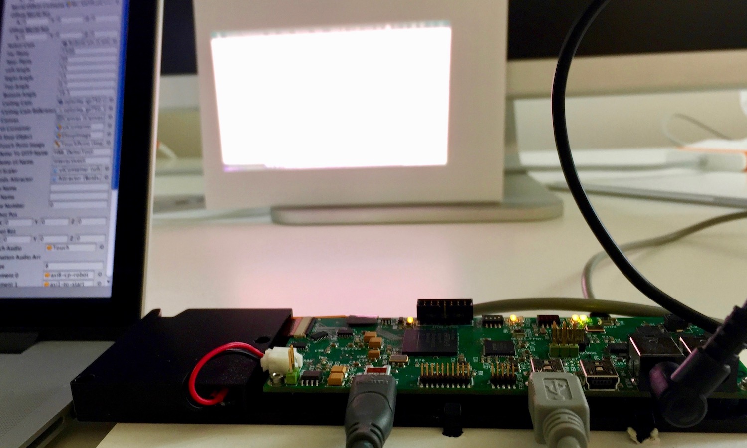 Laser Projector prototype displaying an image.