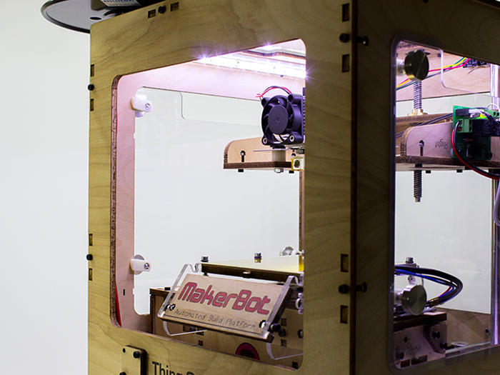 LED lights inside MakerBot, illuminating the interior.