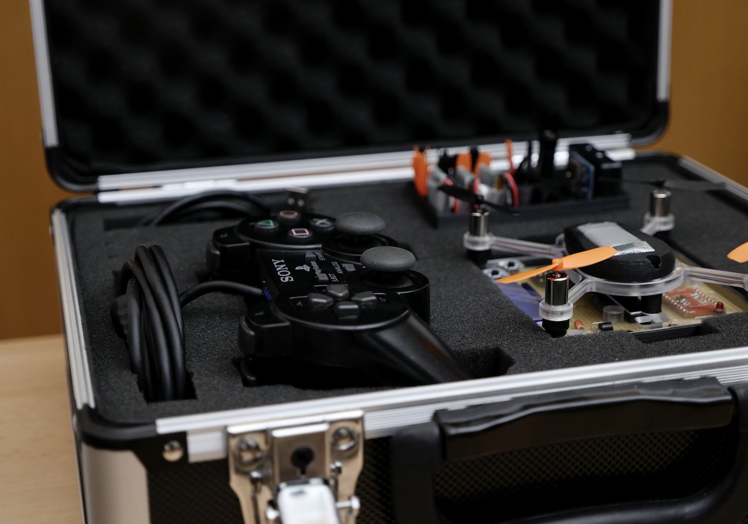 Controller, Picopter with base station, spare parts are all neatly fitted into a custom case.