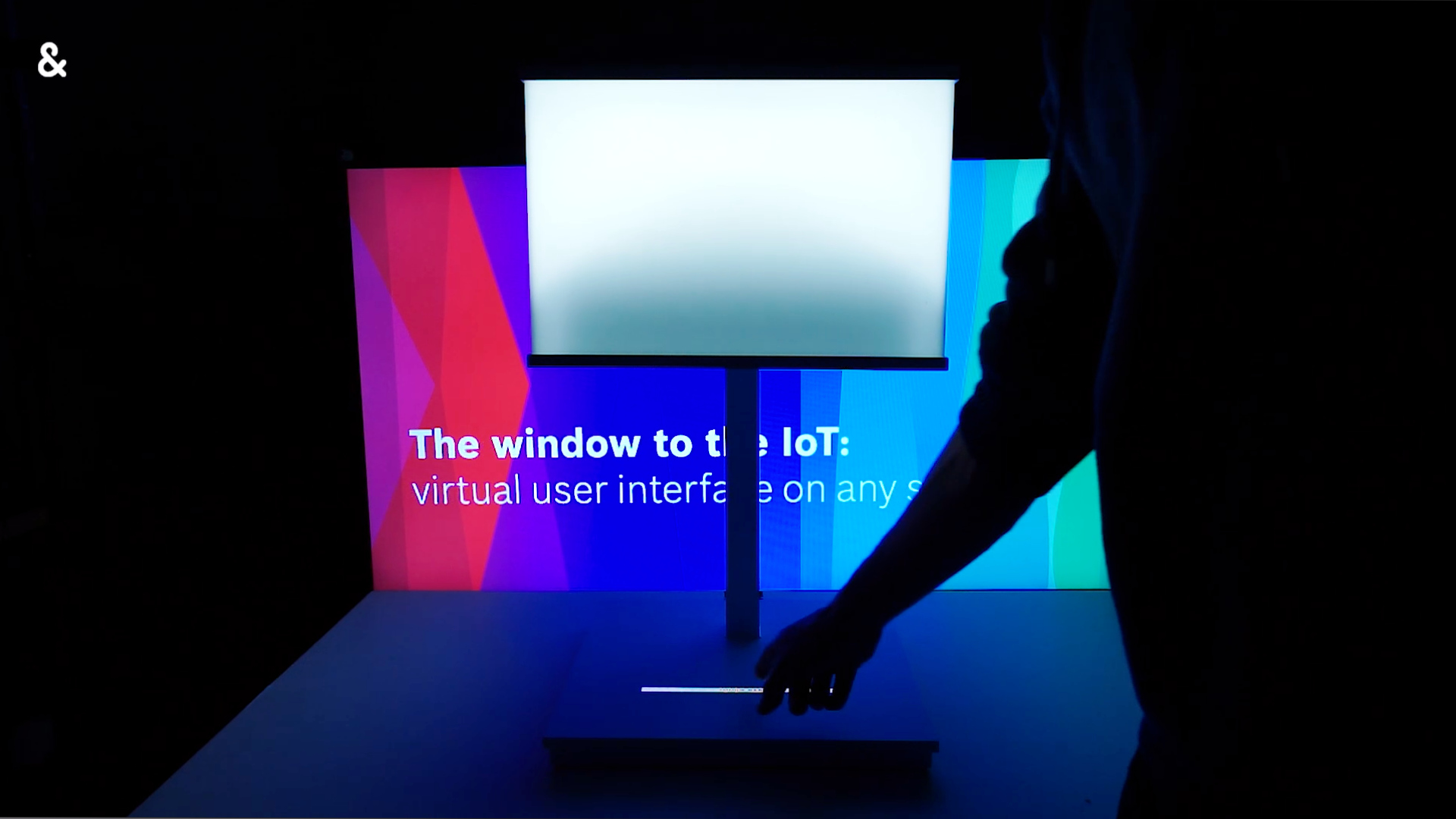 Interactive laser projector integrated into a lamp at CES 2018.