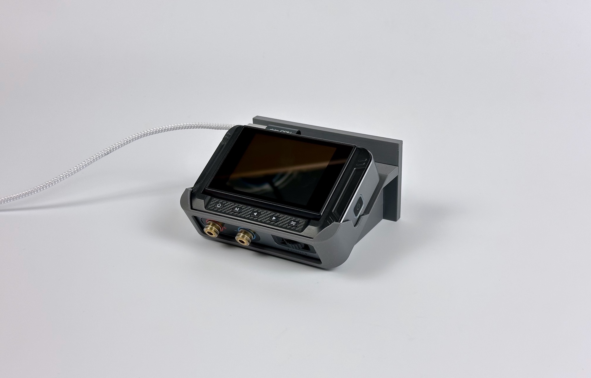 FNIRSI DPS-150 mount with device on a white background